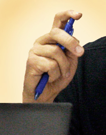 Calvin Owens finger on pen.